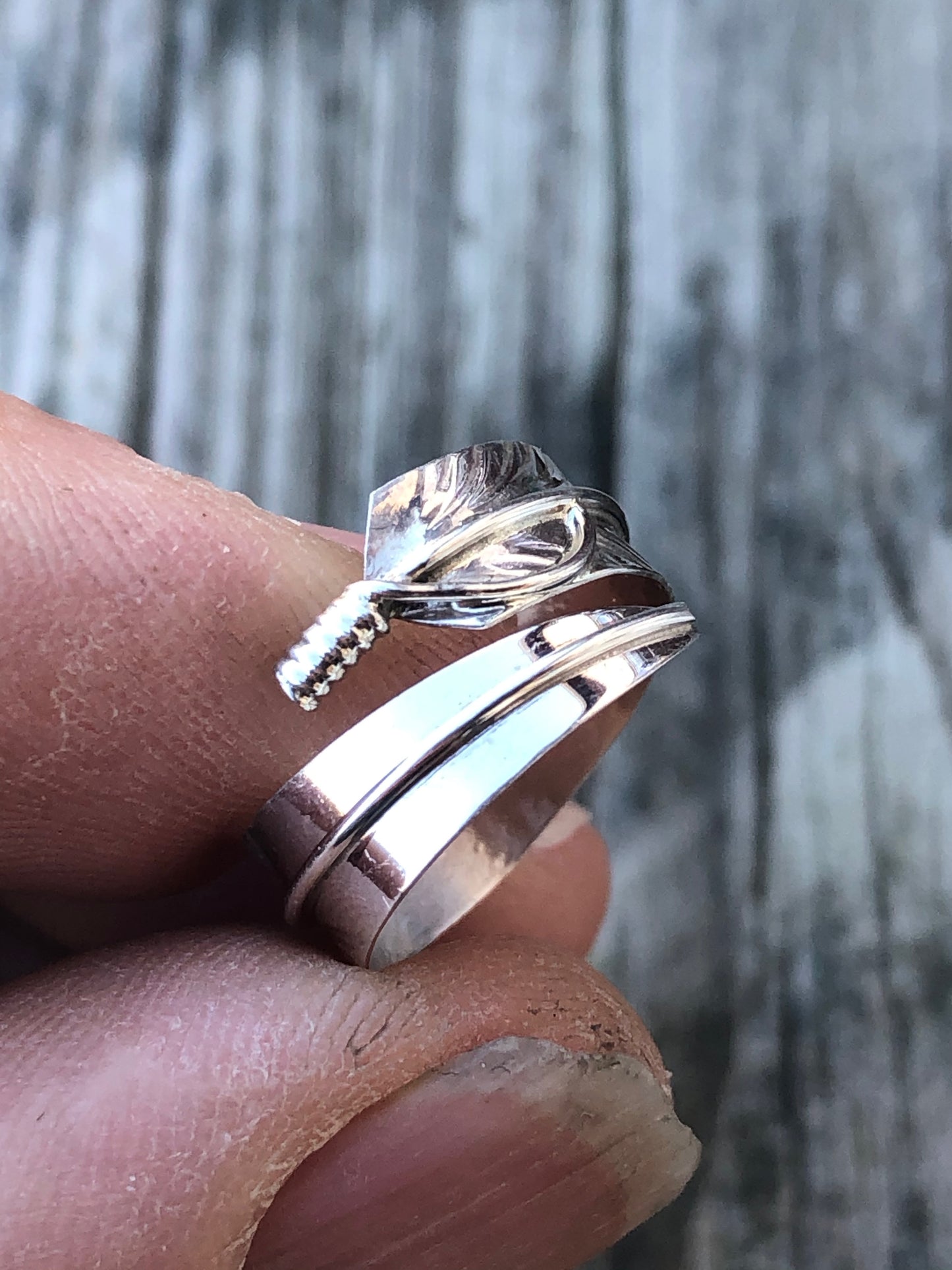 Navajo Sterling silver wrapped feather ring