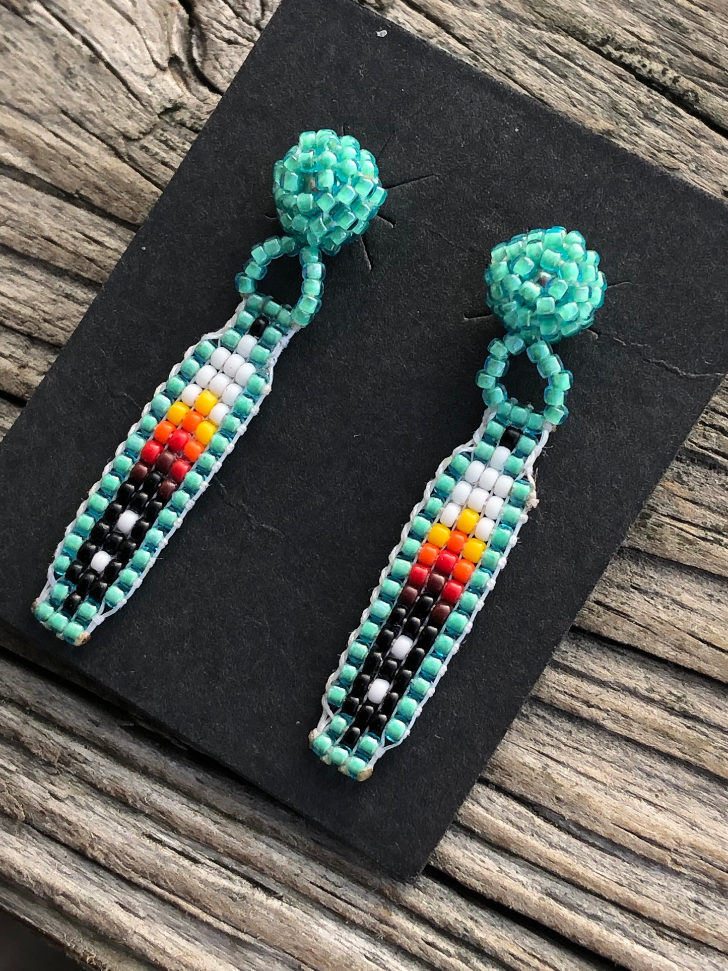 Hand beaded Feather and post earrings