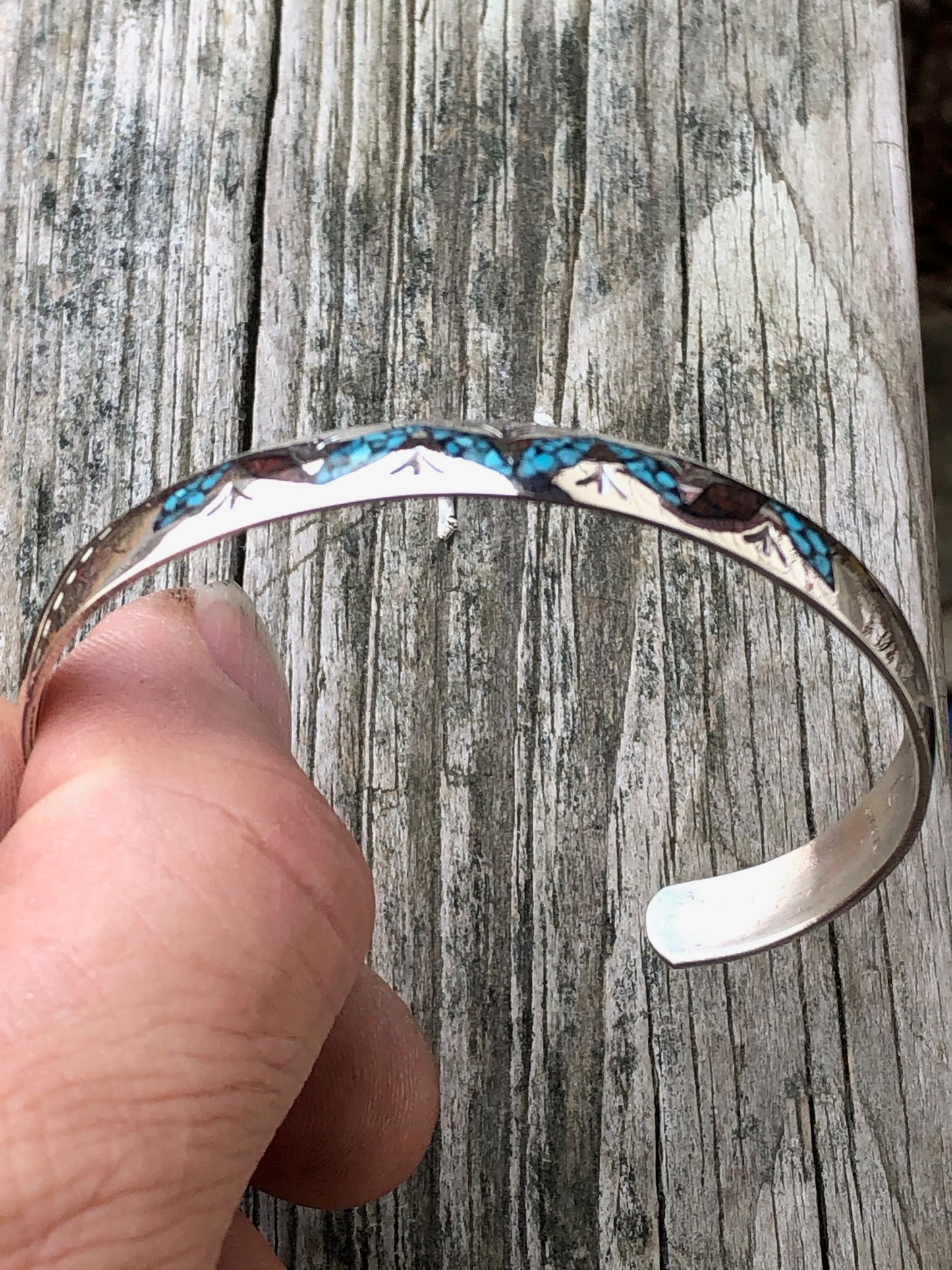 Silver stamped bracelet with Coral and Turquoise chip inlay