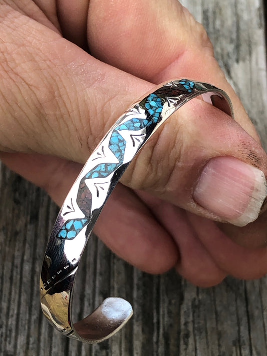 Silver stamped bracelet with Coral and Turquoise chip inlay