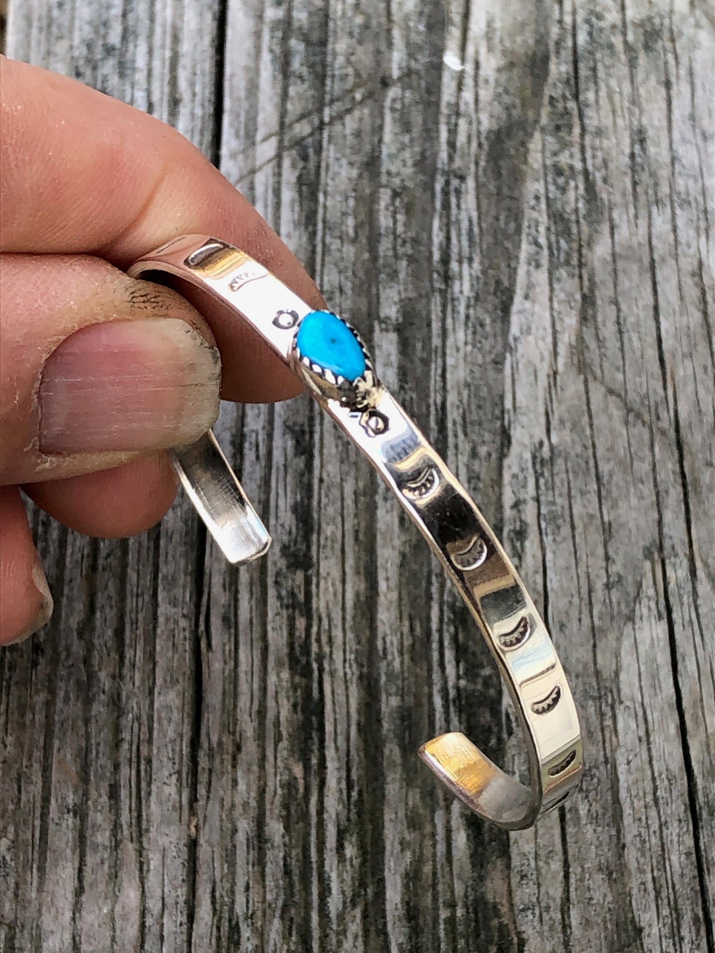 Navajo turquoise and silver stamped bracelet
