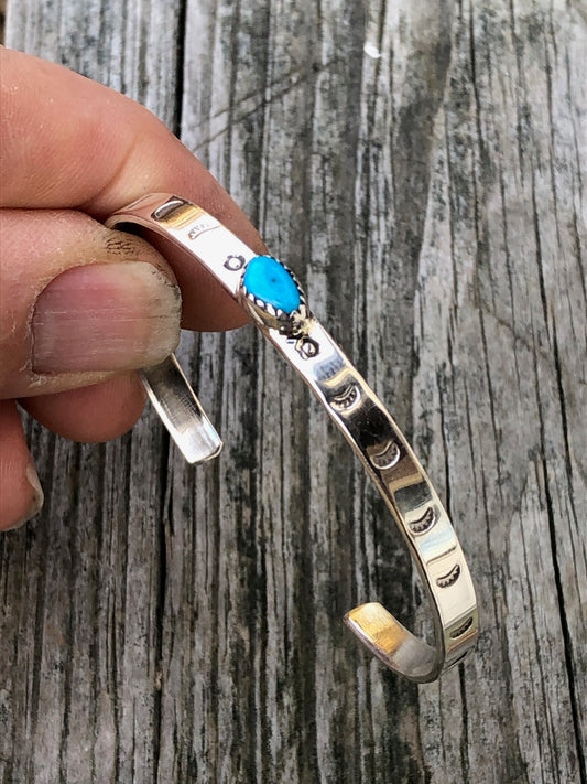 Navajo turquoise and silver stamped bracelet