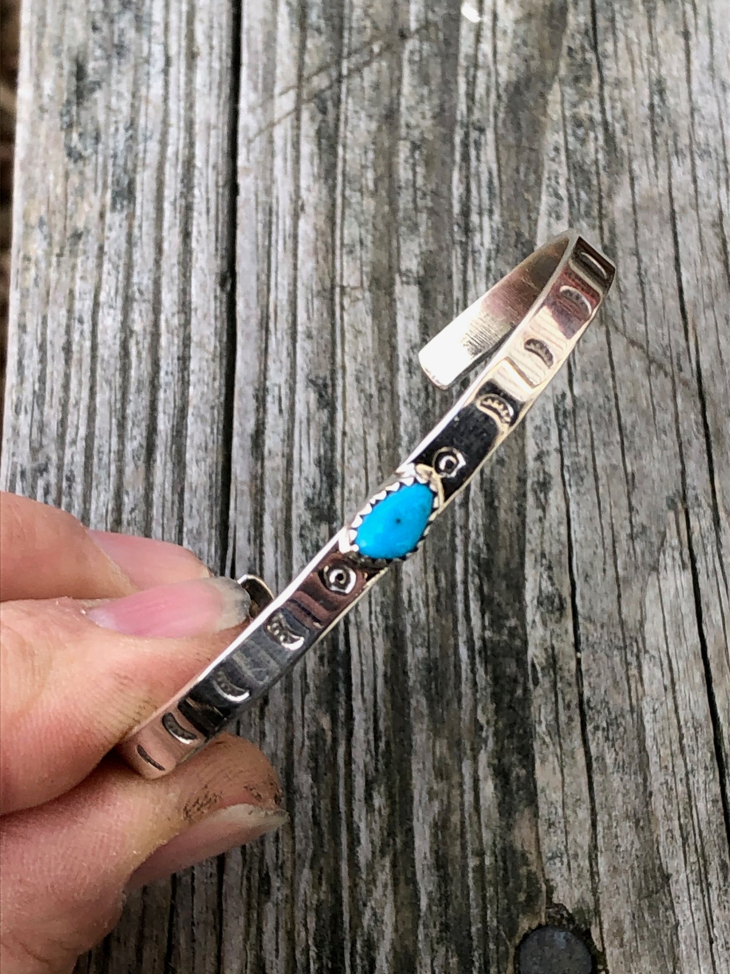 Navajo turquoise and silver stamped bracelet