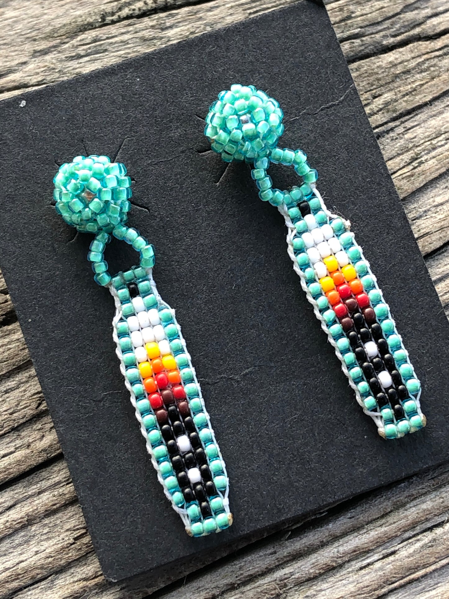 Hand beaded Feather and post earrings