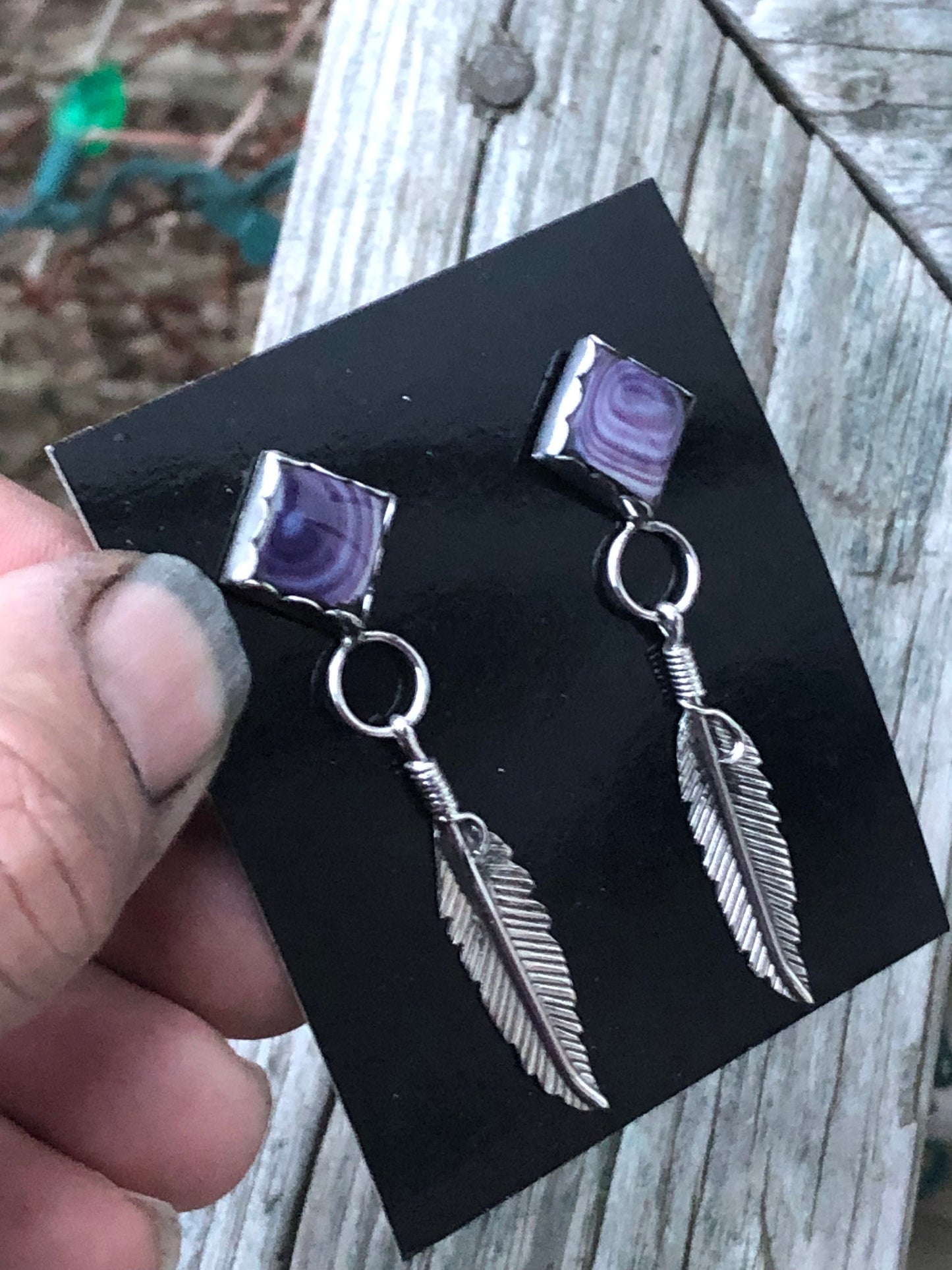 Wampum diamond shape post feather earrings.