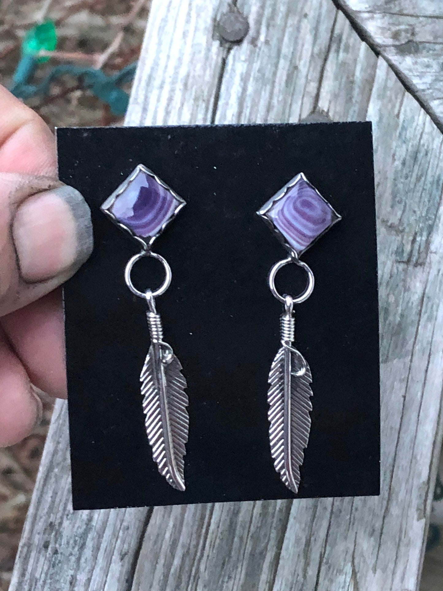 Wampum diamond shape post feather earrings.