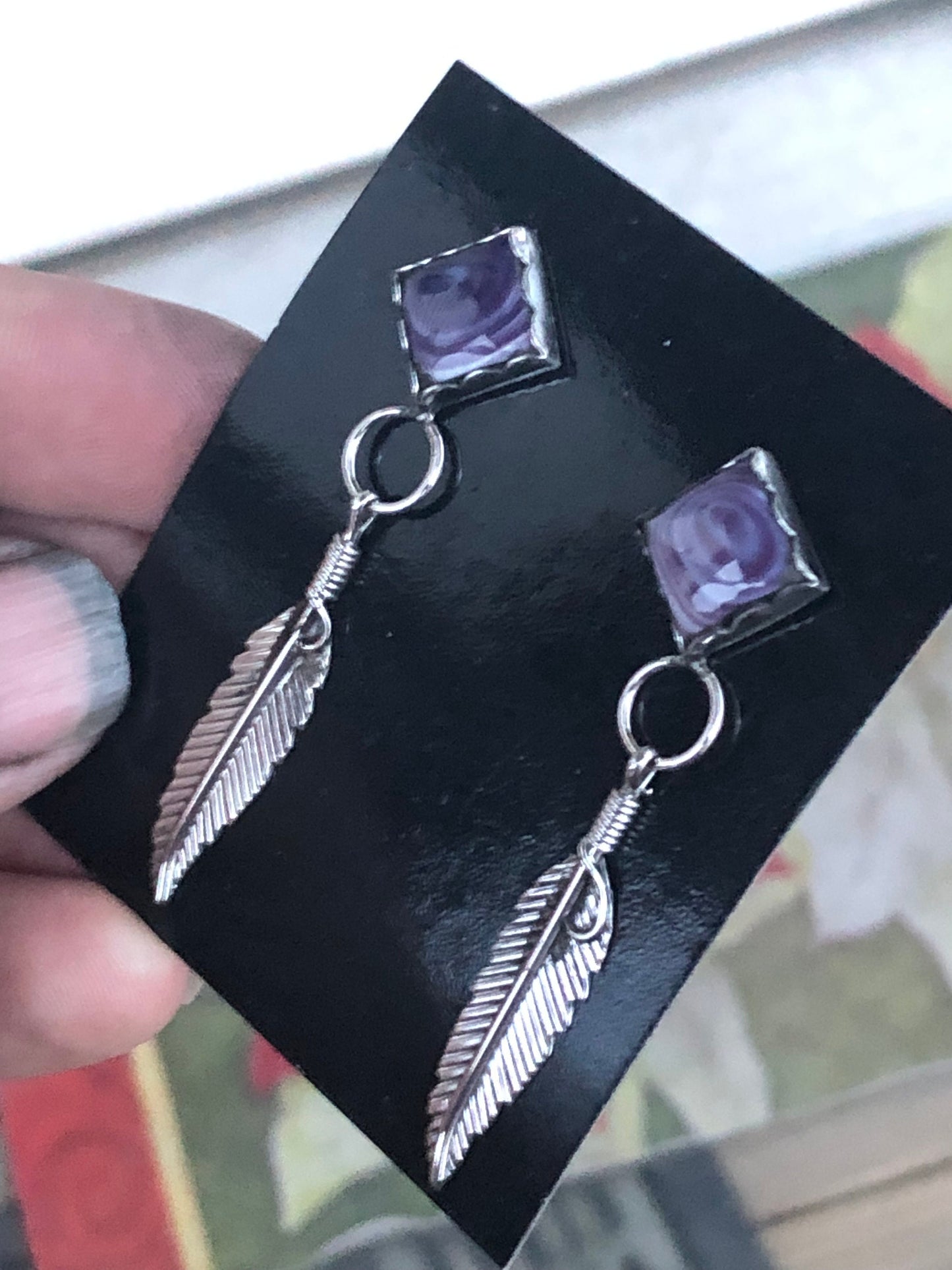 Wampum diamond shape post feather earrings.