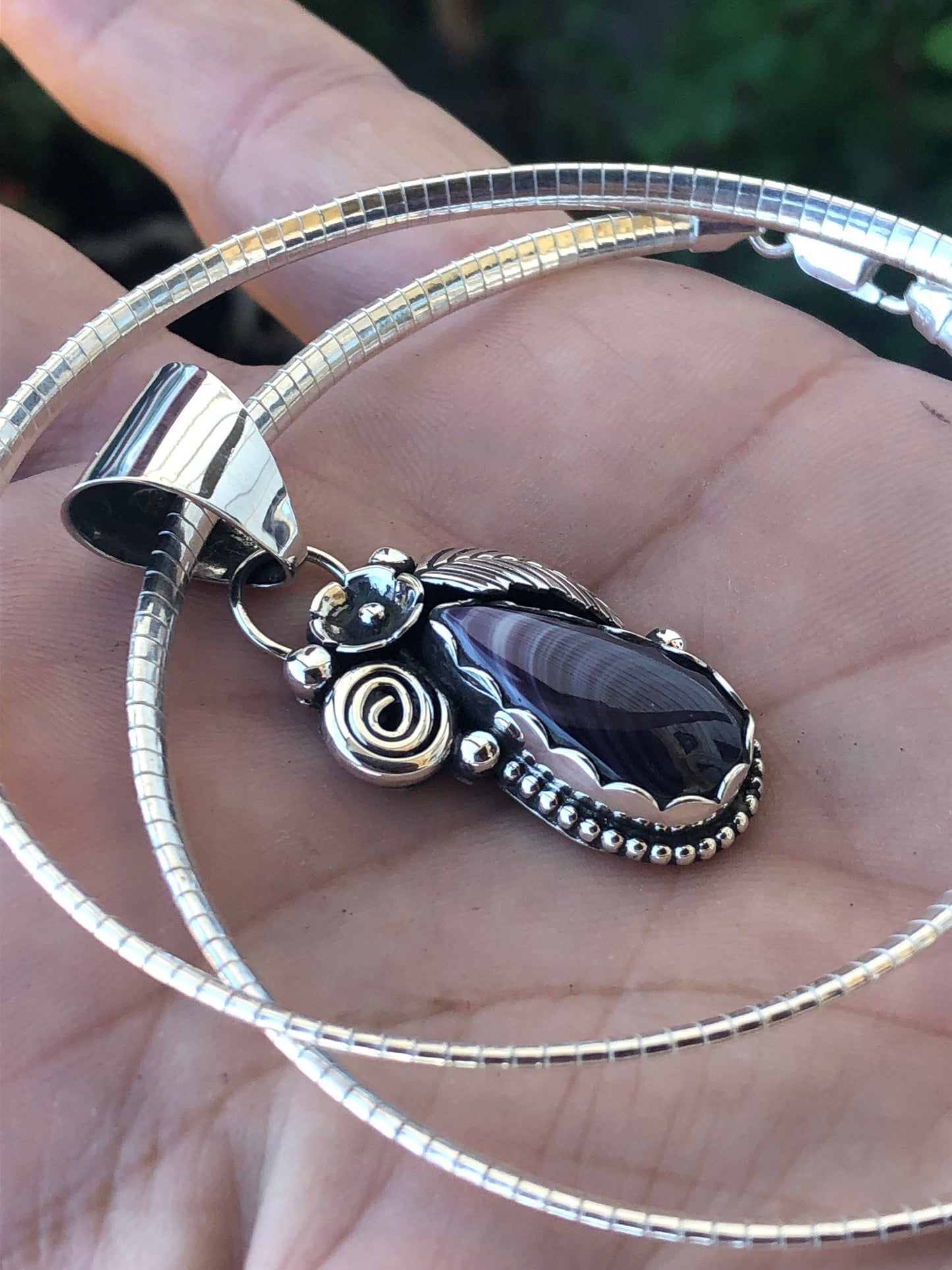 Wampum tear drop leaf flower pendant.