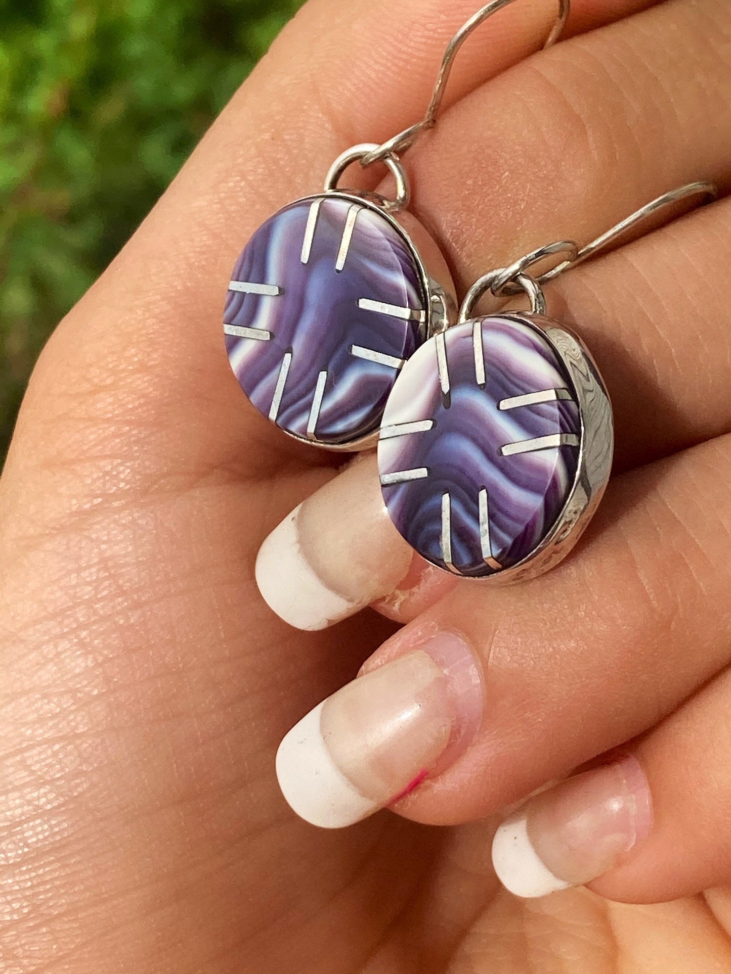 Silver star wampum settings earrings.