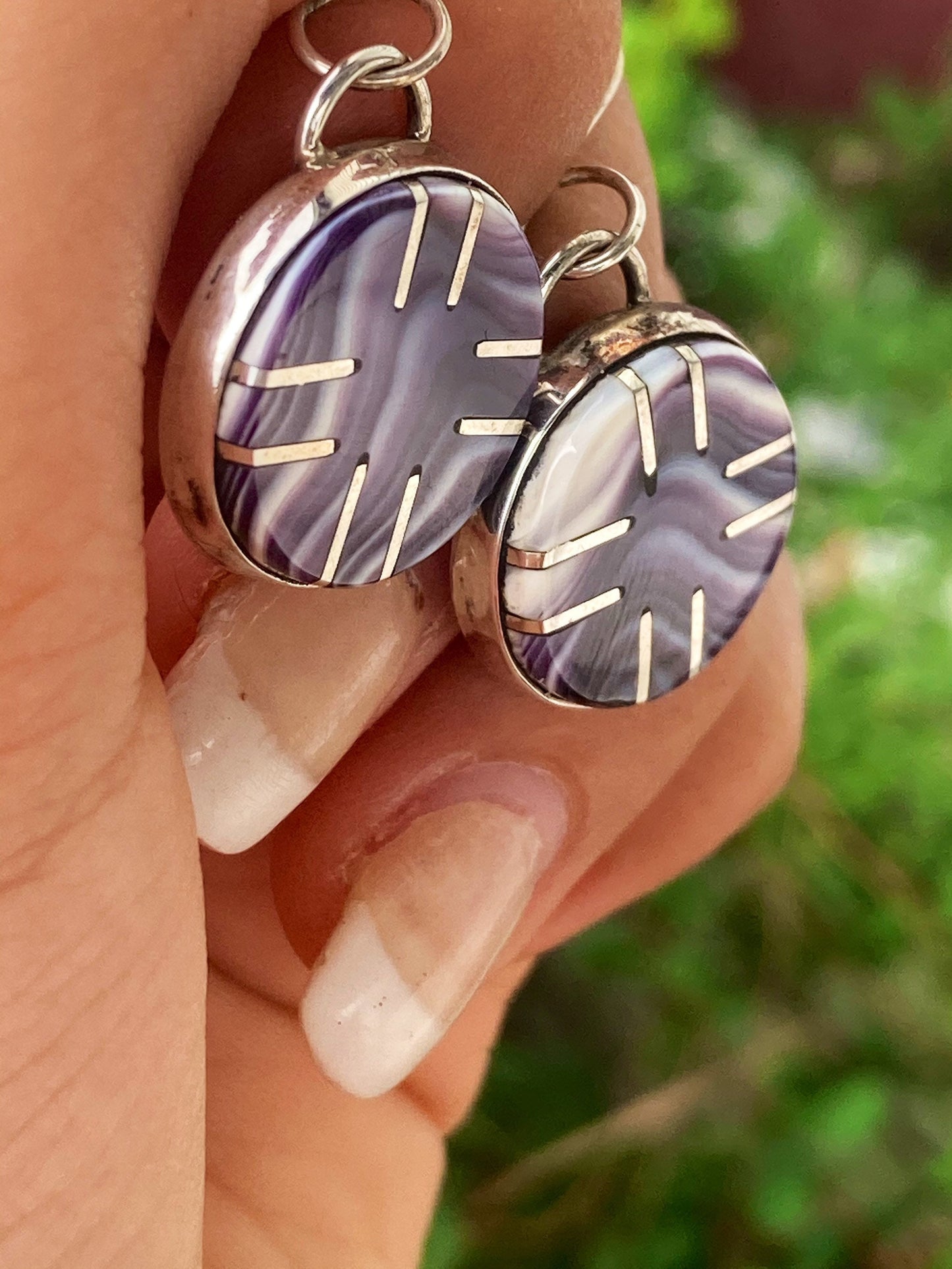 Silver star wampum settings earrings.