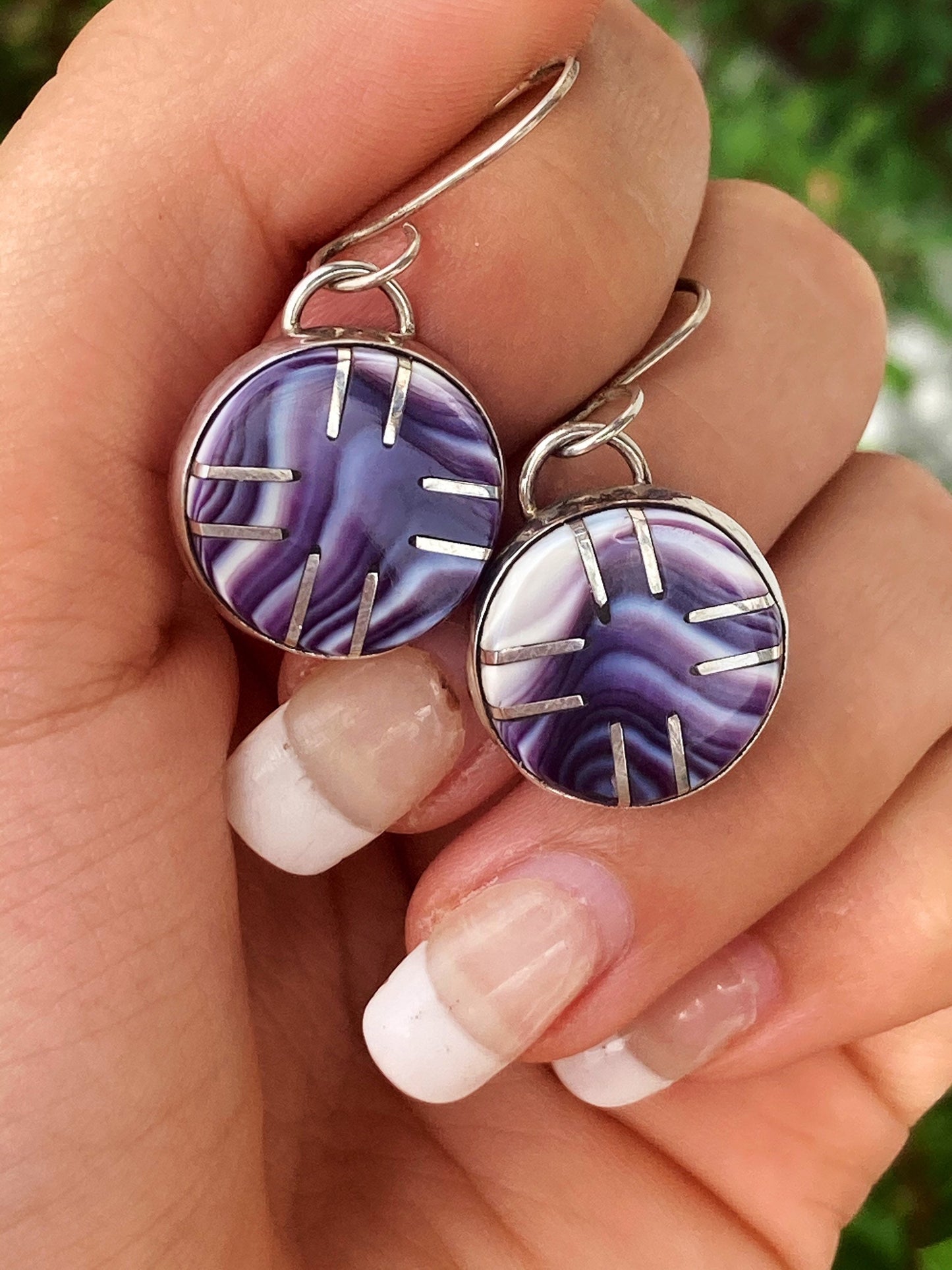 Silver star wampum settings earrings.