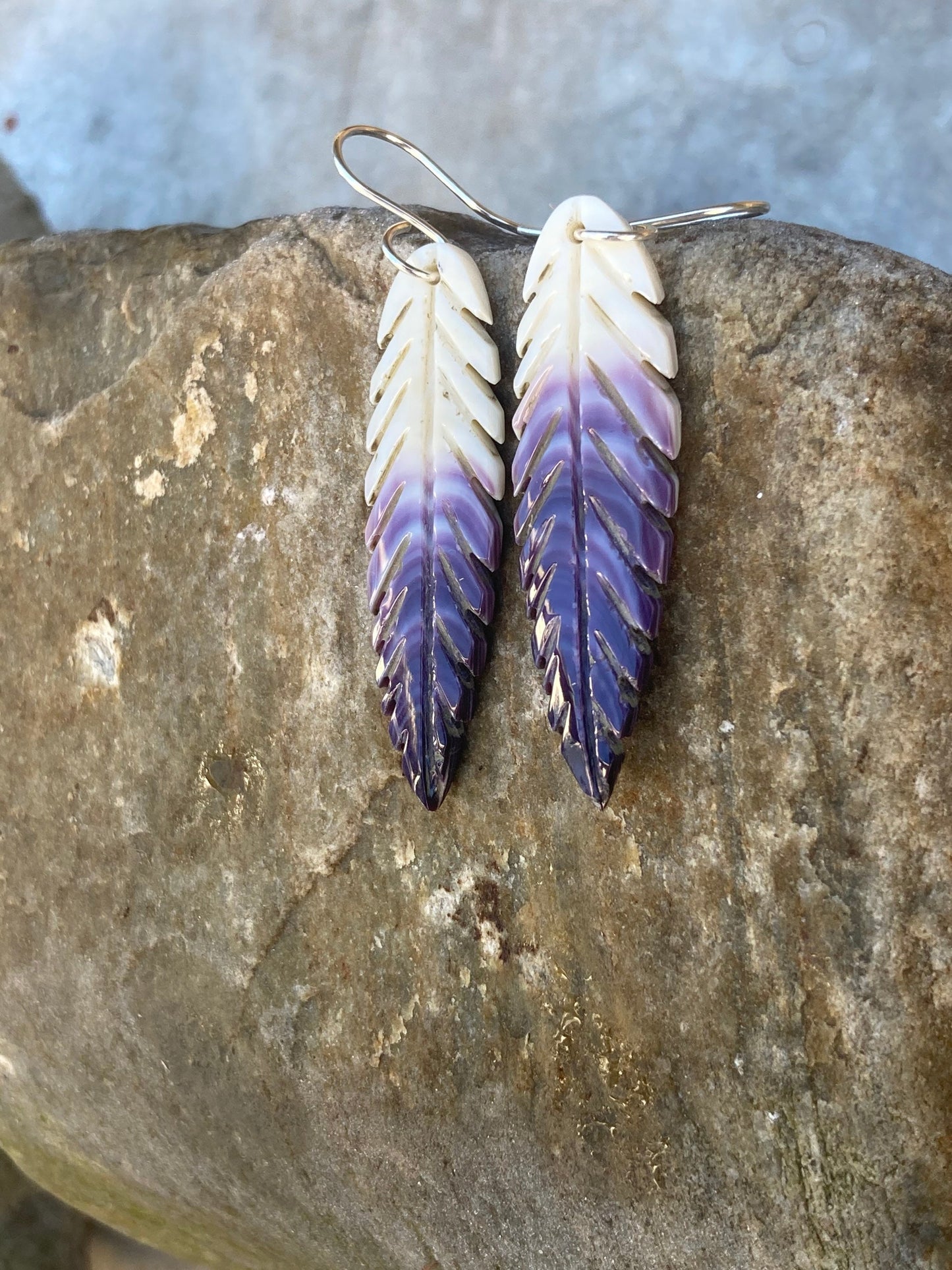 Carved Wampum Feather earrings.