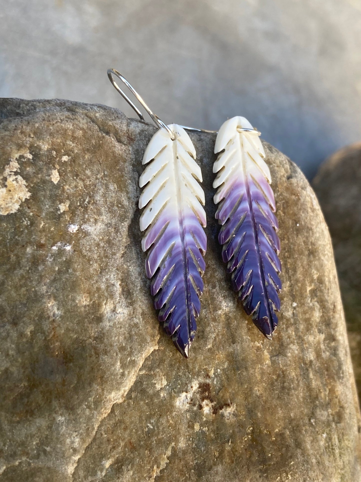 Carved Wampum Feather earrings.