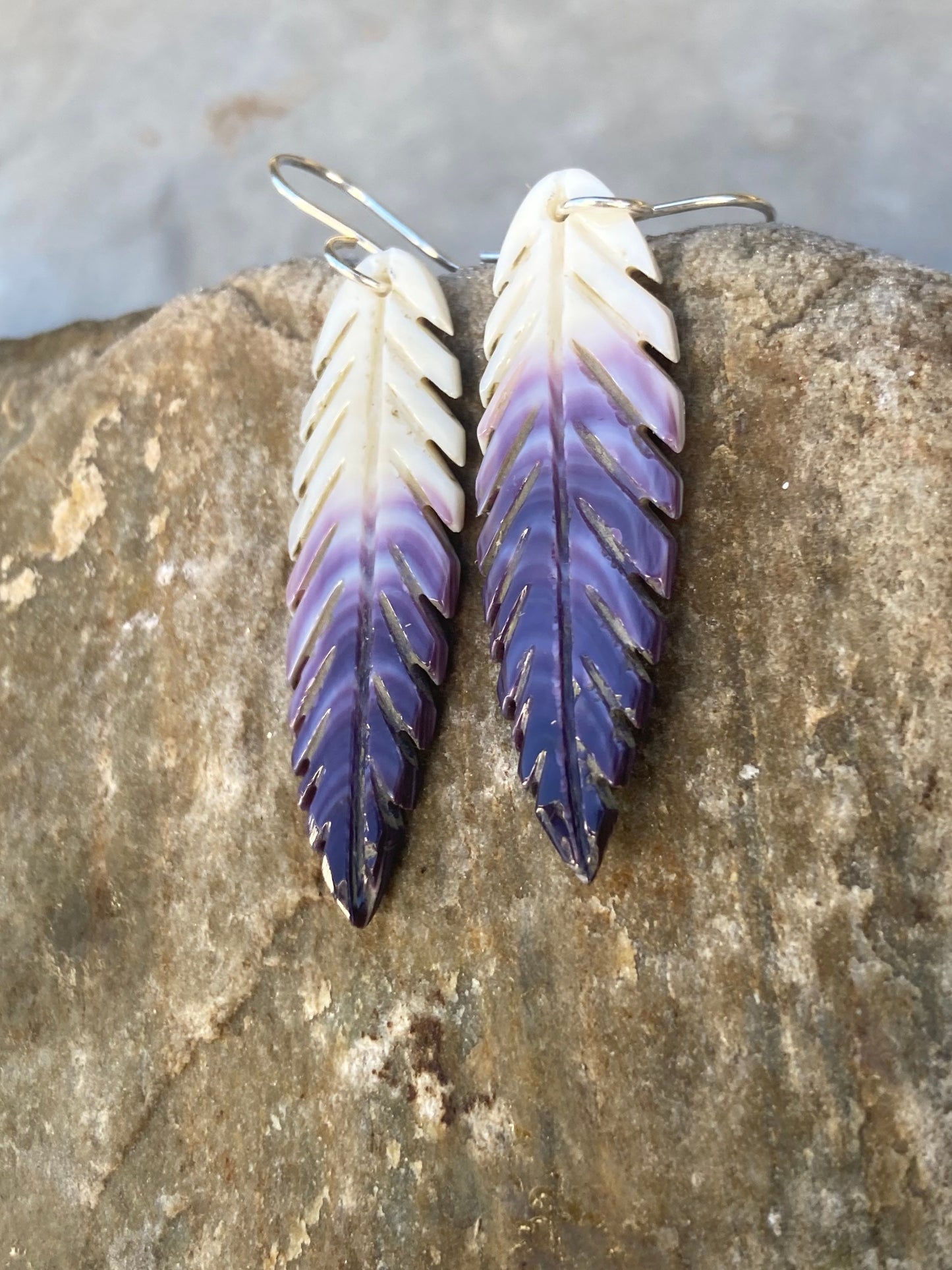 Carved Wampum Feather earrings.