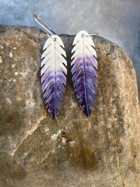 Carved Wampum Feather earrings.