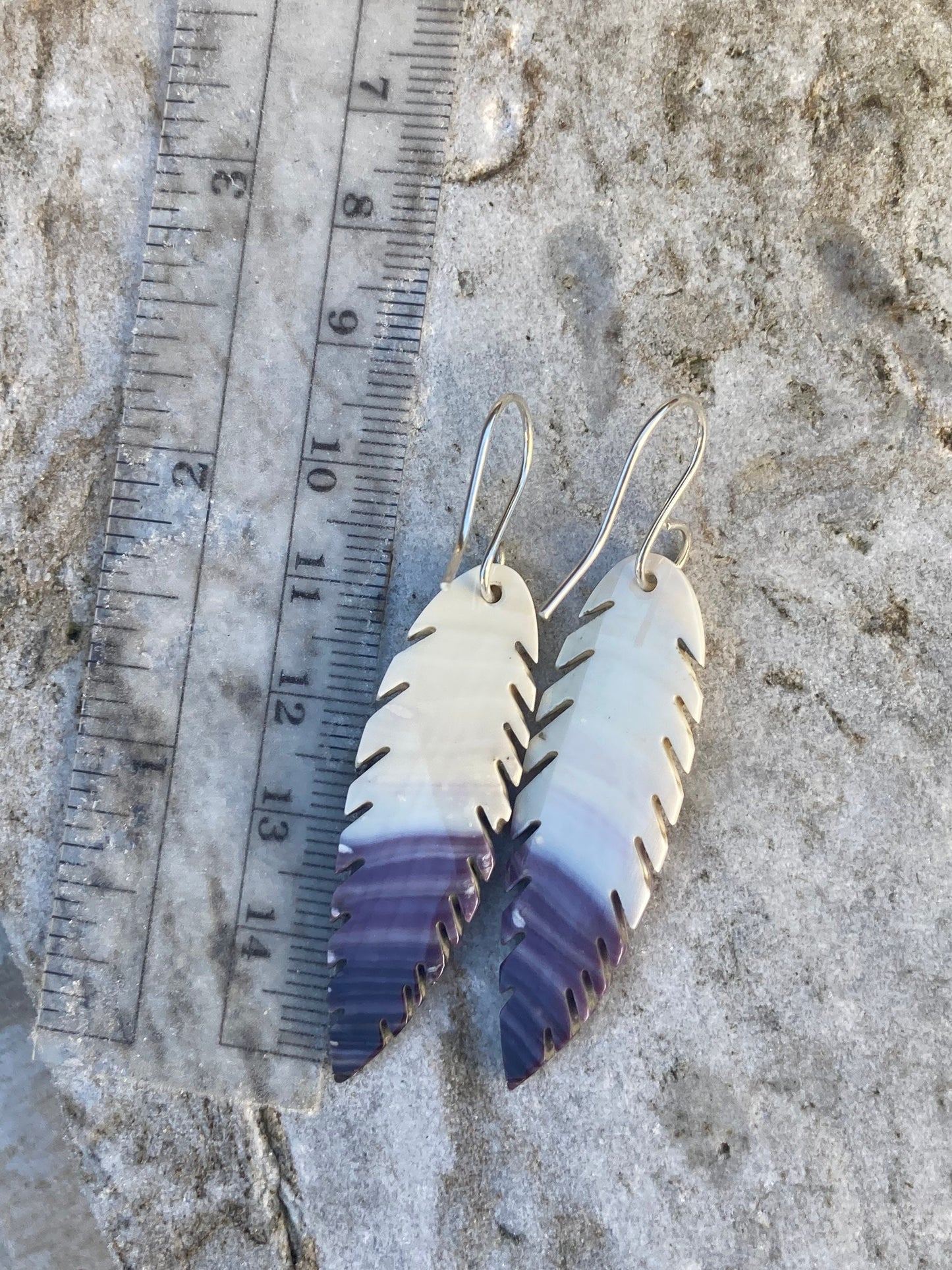 Carved Wampum Feather earrings.